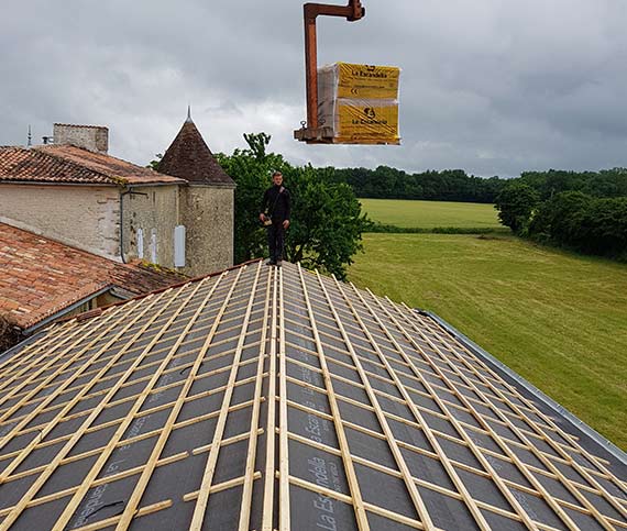 La pose de couverture et de chéneaux